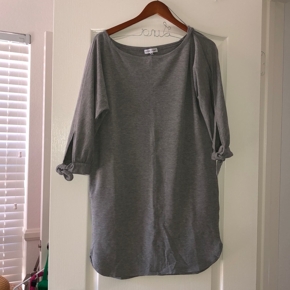 Long grey shirt or wide dress, idk